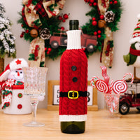 Cubierta de botella de vino de punto con decoración navideña
