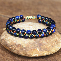 Bracelet Ajustable Oeil de Tigre tissé à la main