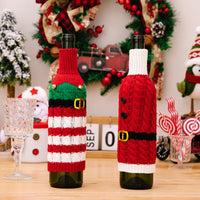 Cubierta de botella de vino de punto con decoración navideña