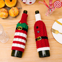 Cubierta de botella de vino de punto con decoración navideña