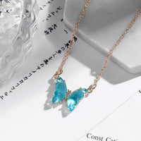 Collier papillon en pierre de cristal