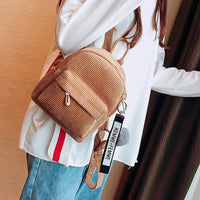 Mini sac à dos boule de poils