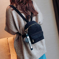 Mini sac à dos boule de poils