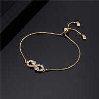 Pulsera con dije de infinito y corazón de circonio para mujer, microconjunto de latón ajustable
