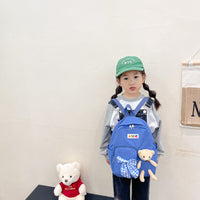 Mochila pequeña con osito de peluche