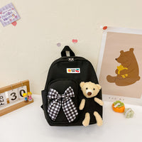 Mochila pequeña con osito de peluche