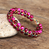 Bracelet Ajustable Oeil de Tigre tissé à la main