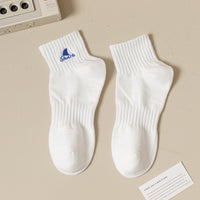 Chaussettes de sport absorbant la sueur en pur coton brodé noir et blanc avec requin