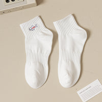 Chaussettes de sport absorbant la sueur en pur coton brodé noir et blanc avec requin
