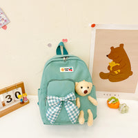 Mochila pequeña con osito de peluche