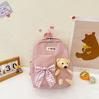 Mochila pequeña con osito de peluche