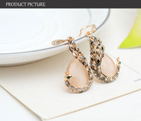 Ensemble collier et boucles d'oreilles en pierres précieuses paon