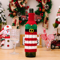 Cubierta de botella de vino de punto con decoración navideña