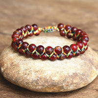 Bracelet Ajustable Oeil de Tigre tissé à la main