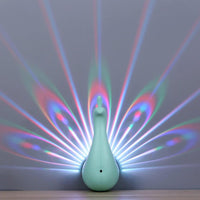 Veilleuse à projection de plumes de paon