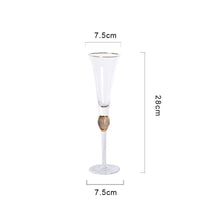Verres à vin et champagne en or et cristal