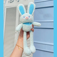 Porte-clés de poupée extensible en peluche avec oreilles de lapin
