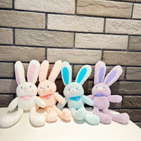 Porte-clés de poupée extensible en peluche avec oreilles de lapin