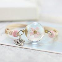 Bracelets à breloques en fleurs séchées et en résine
