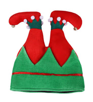 Los elfos navideños se paran sobre sus sombreros