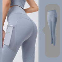 Leggings deportivos con bolsillo lateral de malla
