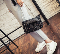 Sac à main veste en cuir riveté