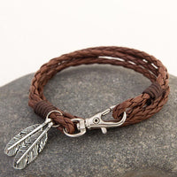 Bracelet en corde et plumes superposées en cuir