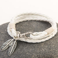 Bracelet en corde et plumes superposées en cuir