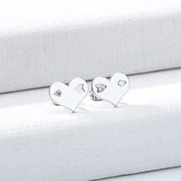 Hollow Arrow Hearts Stud Earrings