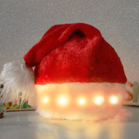 Chapeau de Noël lumineux à LED en peluche
