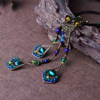 Long peacock sweater chain
