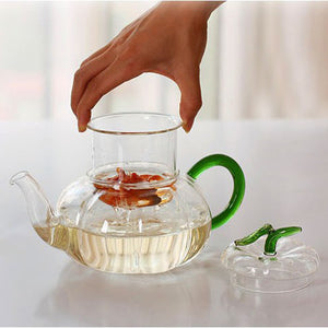 Juego de té de vidrio con olla rayada de calabaza, perfumado hervido