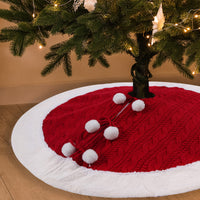 Falda de árbol de Navidad de punto con pompones blancos