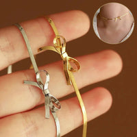 Bowknot Snake Chain Choker Necklace, Long Earrings, & Bracelet
