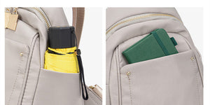Mini mochila ligera de tela Oxford simple y de moda