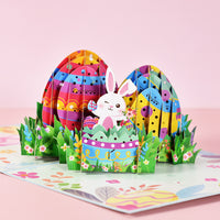 Tarjeta de felicitación emergente 3D hecha a mano de Pascua con huevos de conejo