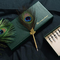 Juego de bolígrafos vintage con plumas de pavo real

