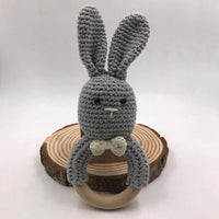 Anneau de dentition en bois de lapin tricoté
