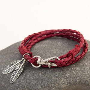Bracelet en corde et plumes superposées en cuir 
