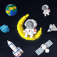 Conjuntos creativos de bloques de construcción de mini astronauta Diy
