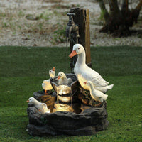 Estatuas de jardín familiar de ardillas y patos
