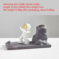 Accesorios de escritorio de astronauta
