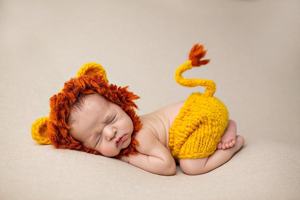 Costume de lion pour photographie de nouveau-né