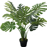 Plante artificielle à feuilles de Monstera tropicales