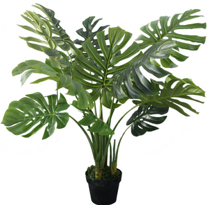 Plante artificielle à feuilles de Monstera tropicales