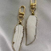 Feather Carved Shell Key Chain