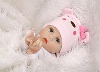 Muñeca bebé realista de ojos azules

