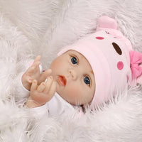 Muñeca bebé realista de ojos azules
