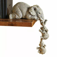 Décoration de maison en trois pièces avec éléphants suspendus
