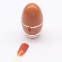 Vernis à ongles en forme d'œuf
